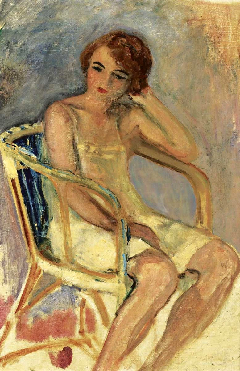 Donna seduta sulla sedia